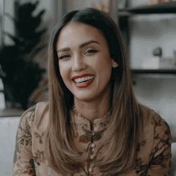 Jessica Alba Giggles While Holding Hair GIF