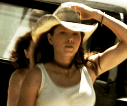 Jessica Biel Holding Her Cowboy Hat While Running GIF