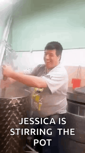Jessica Stirring Pot In Kitchen GIF