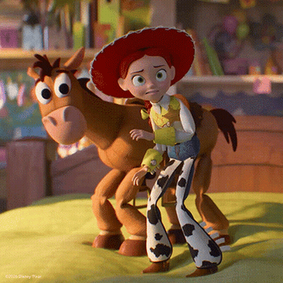 Jessie And Bullseye From Toy Story Are Standing Next To Each Other On A Bed GIF