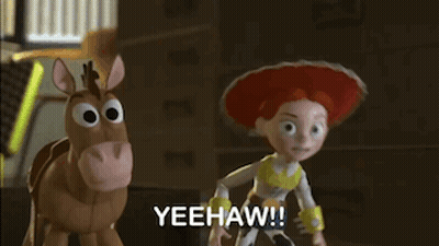 Jessie From Toy Story Standing Next To Stuffed Horse Saying Yeehaw GIF