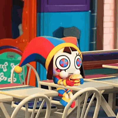 Jester Doll Sitting At Table With Hamburger GIF