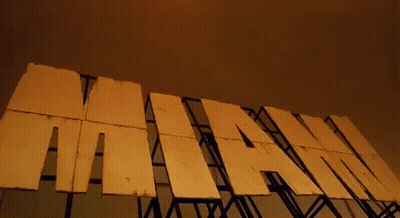 Jet Flying Over Miami Sign GIF