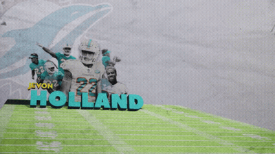 Jevon Holland Poster With Dolphins Players GIF