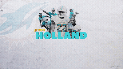 Jevon Holland Surrounded By Teammates GIF