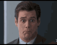 Jim Carey Funny Mouth Sucking Reaction GIF