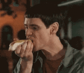 Jim Carrey Eating Sausage GIF