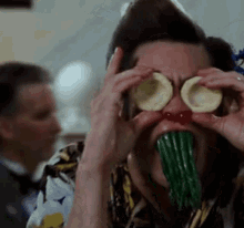 Jim Carrey Making Faces With Food GIF