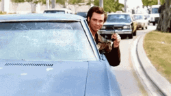 Jim Carrey Peeking Out Of Cool Car GIF