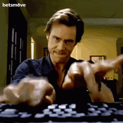 Jim Carrey Working Hard GIF