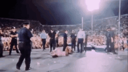 Jim Morrison Surrounded By Policemen GIF