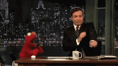 Jimmy Fallon Applauds While Elmo Looks On GIF