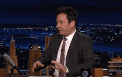Jimmy Fallon Shrugs GIF