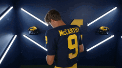 Jj Mccarthy Smiling While Holding Football GIF