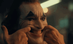 Joaquin Phoenix Joker Laughing Trying His Best GIF