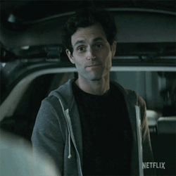 Joe Goldberg Shaking Head Smile GIF