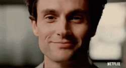 Joe Goldberg Smile Serious Face GIF