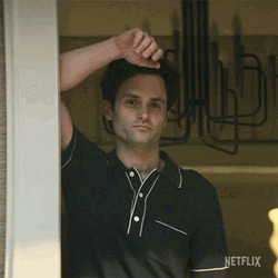 Joe Goldberg Waving Hand Raising Eyebrows GIF