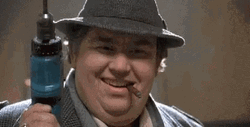 John Candy Holding A Drill GIF