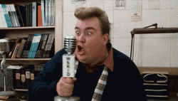 John Candy Strangling A Microphone GIF