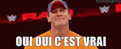 John Cena In Yellow Shirt And Blue Hat Says Oui Oui C'est Vrai GIF