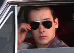 John Cusack Remove Sunglasses And Wink Wink GIF