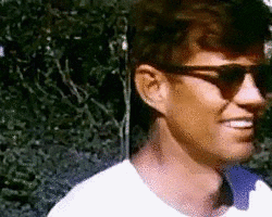 John F. Kennedy Removing Sunglasses