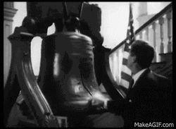 John F. Kennedy Touching Old Bell