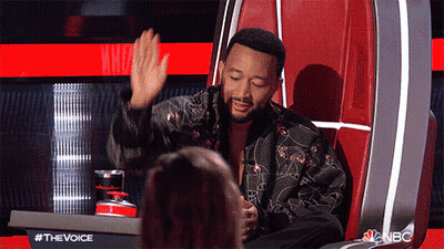 John Legend High Five In Judges Chair GIF