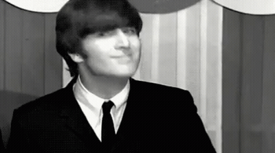 John Lennon In Suit And Tie Making Funny Face GIF