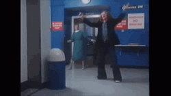 John Lennon Kicking Trash Can GIF