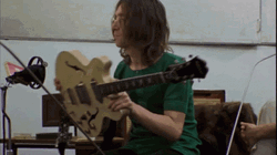 John Lennon Shaking Guitar GIF
