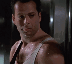 John McClane Weak Smile Die Hard GIF