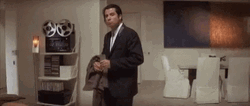 John Travolta Looking Behind To Search GIF
