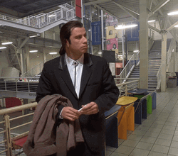 John Travolta Looking For Something GIF