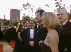 John Travolta Waving Hello GIF