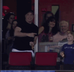 John Travolta With People Dancing Behind GIF