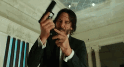 John Wick Loading Gun GIF