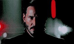 John Wick Staring Closely GIF