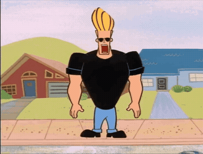 Johnny Bravo Standing On Sidewalk GIF