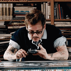 Johnny Depp Searching On Map GIF