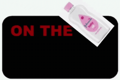 Johnson's Baby Oil Next To Digital Clock GIF
