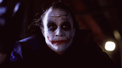 Joker Close Up With Purple Background GIF