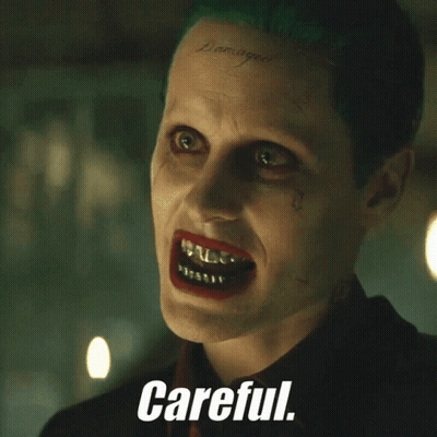 Joker Face Saying Careful GIF