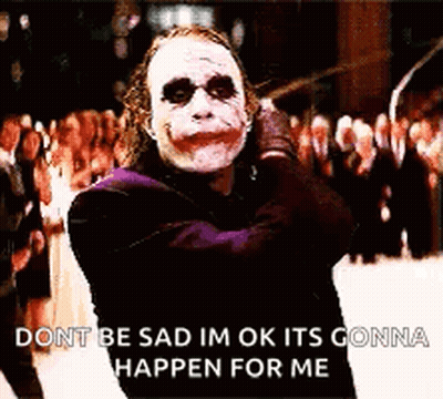 Joker From The Dark Knight Standing In Front Of Crowd GIF