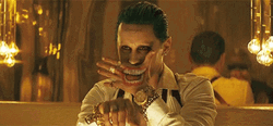 Joker Hand With Smiling Tattoo