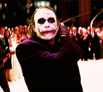 Joker In Purple Suit And Gloves Before Crowd GIF