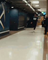 Jokic Sprinting Down Hall GIF