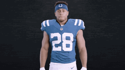 Jonathan Taylor Flexing Muscles GIF