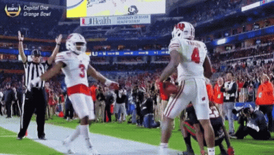 Jonathan Taylor Holding Football With Number 23 Jersey GIF